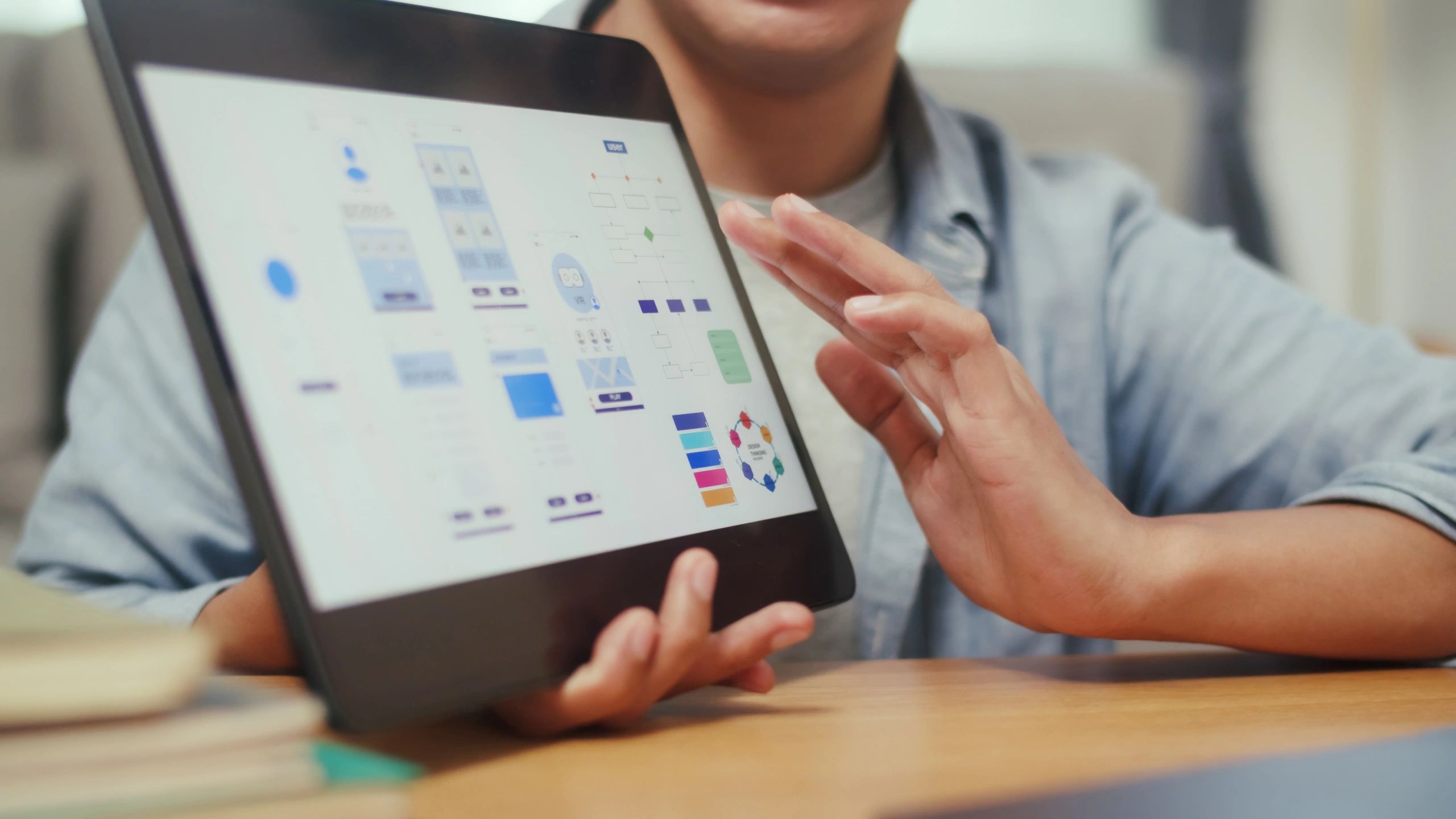 Designer reviewing a mobile app interface